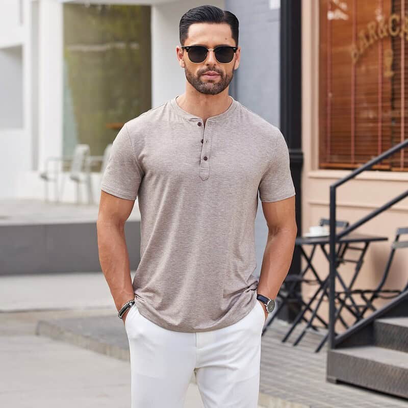 man with sunglasses wearing a henley shirt