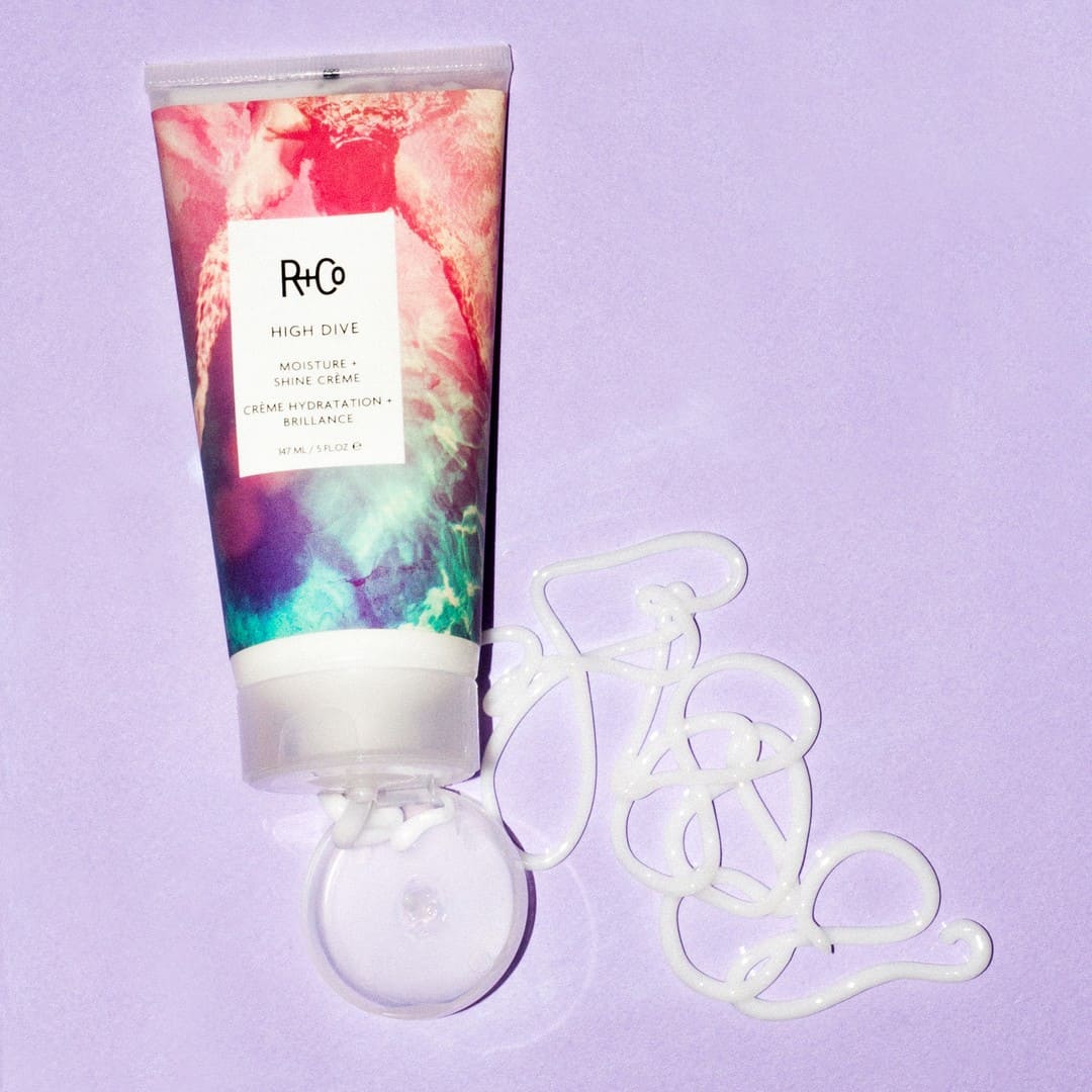an open tube of r+co high dive moisture shine creme