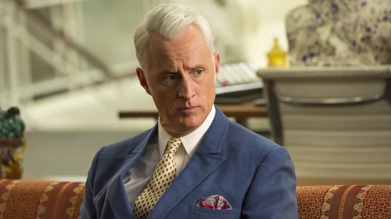 John Slattery's Roger Sterling wearing a fancy blue suit on Mad Men